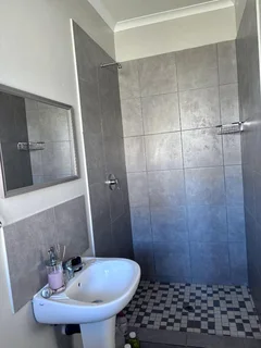 **Spacious 3-Bedroom with build in cupboards in secure community,with added seabreeze***