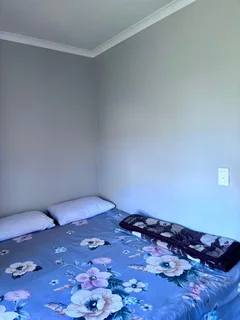 **Spacious 3-Bedroom with build in cupboards in secure community,with added seabreeze***