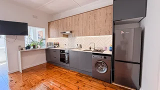 A Sun-Filled Top-Floor Gem in the Heart of Green Point!