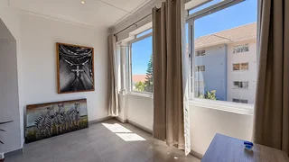 A Sun-Filled Top-Floor Gem in the Heart of Green Point!
