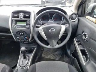 Silver Nissan Almera 1.4 with 65000km available now!