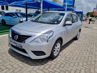 Silver Nissan Almera 1.4 with 65000km available now!