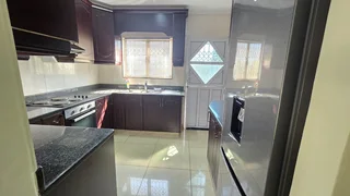 Stylish 3 Bedroom Townhouse with Big Backyard!