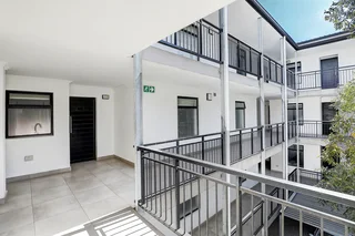 Secure North-Facing Two-Bedroom Apartment with Balcony, Views &amp; Tandem Basement Parking