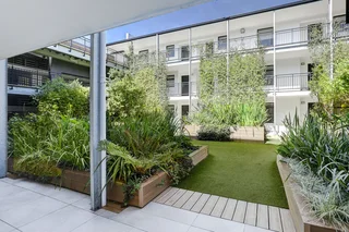 Secure North-Facing Two-Bedroom Apartment with Balcony, Views &amp; Tandem Basement Parking