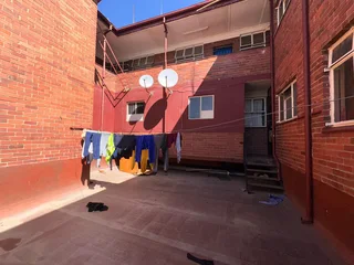 410sqm Block of Flats for Sale in Pretoria Central — Mixed-Use Building with Flats &amp; Shops