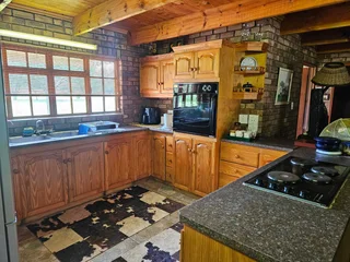 Double storey four bedroom thatch house on the banks of the Vaalriver