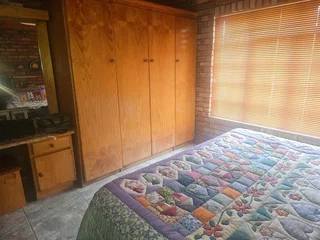 Double storey four bedroom thatch house on the banks of the Vaalriver