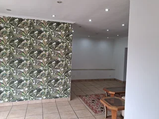 One Bedroom Flatlet With A Spacious Lounge, Modern With A Shower And A Bath.