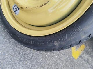 Mitsubishi Lancer spare/emergency/biscuit tyre in excellent condition.