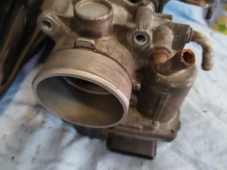 Breaking  up Mitsubishi  2 liter  4B11 for spares,All original parts and body parts.List below.