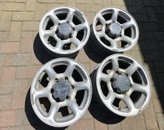 Isuzu tailgates,  rims, towbar, taillights and other spares