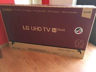 LG 65 inch UHD Smart Tv - 4K - As New ! Box - Unused pedestals !