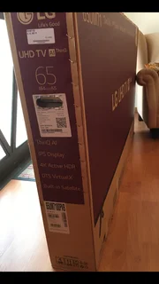 LG 65 inch UHD Smart Tv - 4K - As New ! Box - Unused pedestals !