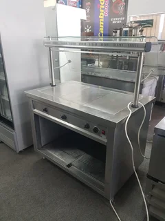 Heated display unit with glass