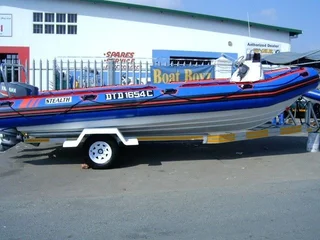 NEW STEALTH 7.2M SEMI RIGID ON TRAILER