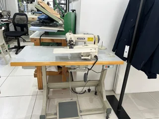 Blind stitch sewing machine