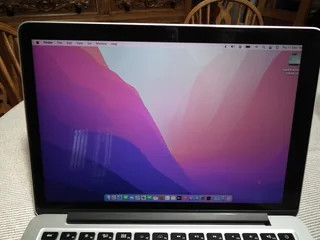 2015 Apple MacBook Pro core i5 at 2.7GHz, 8GB LPDDR3 SDRAM, 128GB 4 Lane PCIe-based flash storage