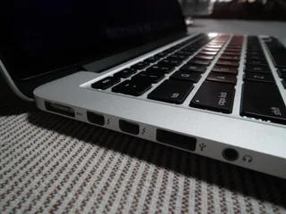 2015 Apple MacBook Pro core i5 at 2.7GHz, 8GB LPDDR3 SDRAM, 128GB 4 Lane PCIe-based flash storage