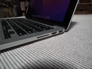 2015 Apple MacBook Pro core i5 at 2.7GHz, 8GB LPDDR3 SDRAM, 128GB 4 Lane PCIe-based flash storage