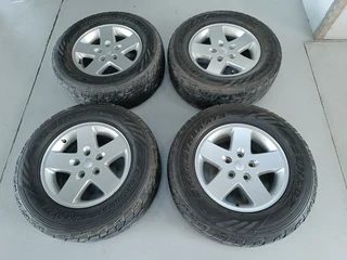 265.65R17 Dunlop Grandtrek AT Jeep Rims and tyres for sale.