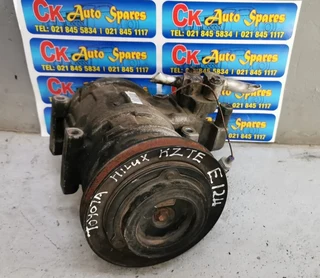 Toyota Hilux KZTE air con pump for sale.