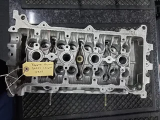 Toyota Corolla Runx shape 1.8 4ZZ cylinder head for sale.
