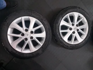 Toyota Corolla Quest 5x114 16 inch 205.55.16 tyres with 50% thread left for sale.
