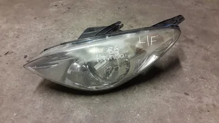 Hyundai i20 2010 left front headlight for sale.