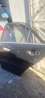 Toyota Camry 2.0 2005 left rear door for sale.