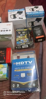 Box full of new gadgets and solar lights