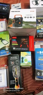 Box full of new gadgets and solar lights