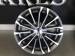 New 15 inch TYT 52 spoked mags to fit the new Toyota