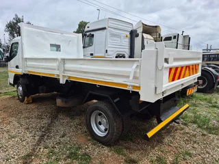 2013 Fuso 4cub tipper dropside body truck