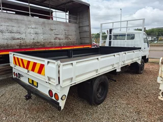 Toyota Duna with dropside body truck 4 ton