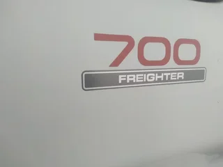 2011 Isuzu FTR700 Garbage box truck with tail lift.