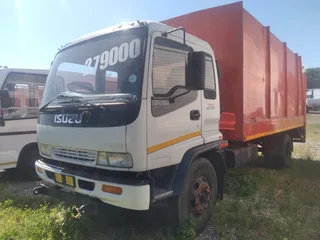 2011 Isuzu FTR700 Garbage box truck with tail lift.