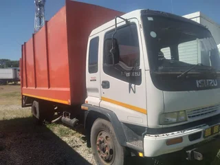 2011 Isuzu FTR700 Garbage box truck with tail lift.