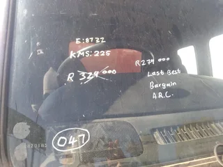 2011 Isuzu FTR700 Garbage box truck with tail lift.