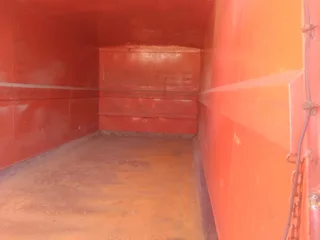 2011 Isuzu FTR700 Garbage box truck with tail lift.