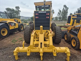 Cat 140H Grader with rippers