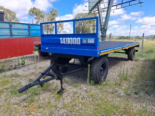 2010 Draw bar flat deck trailer