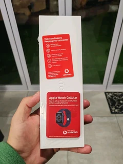 Sealed Apple Watch Series 9 GPS + Cellular 41mm Silver Aluminium Case with Storm Blue Sport Band