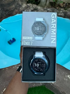 Garmin Fenix 7 – Sapphire Solar EditionMineral Blue DLC Titanium with Whitestone Band