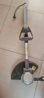 Ryobi 700w electric weedeater trimmer in new condition used once