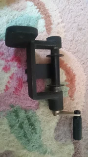 Camera bean bag, vintage lens and 35mm film reel