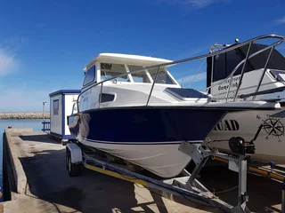 Vision 24 with 2 x 115 Suzuki 4 Strokes