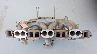Mercedes-Benz W123 250 exhaust/intake manifold