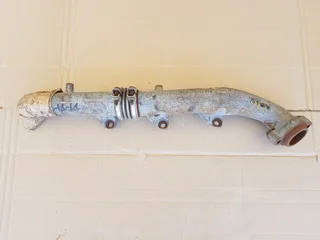 Mercedes-Benz M116 8cyl exhaust manifold NOS