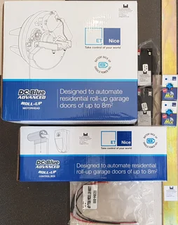 Roll Up Garage Door Motor Kit New Complete Batteries Remotes